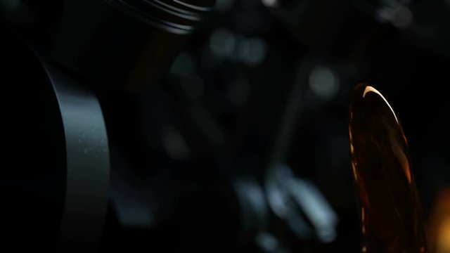 3d footage with car engine working. Concept of motor with oil splash