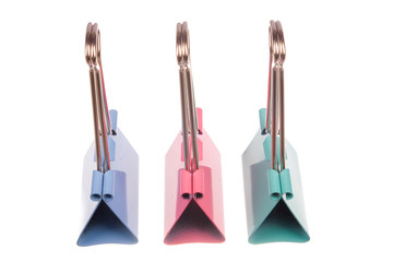 Multi coloured  paper clip isolated on white background