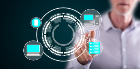 Man touching devices connection concept