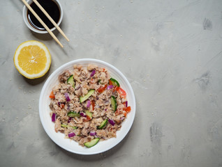 Thai Tuna Salad on the gray table. Top view. 