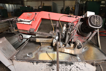 Large electric saw for cutting metal. Metal saw in the factory