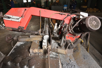 Large electric saw for cutting metal. Metal saw in the factory