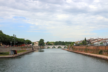 Naklejka premium Tiberius bridge Rimini cityscape Italy