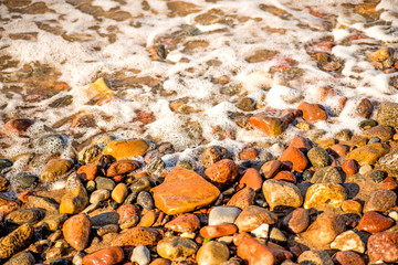 surf of the Balti sea on pebbles