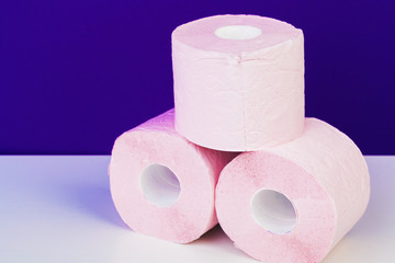 Roll of toilet paper or tissue  on color background