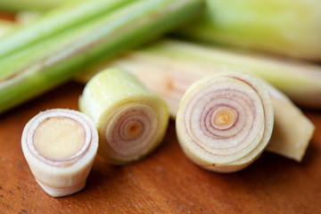 lemongrass slices on wood background.