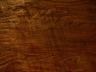 Empty wooden table background texture with sunlight on surface, top view