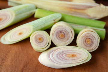 lemongrass slices on wood background.