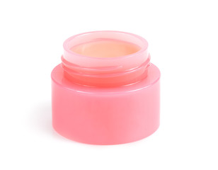 Lip balm in the container isolated on white background