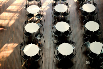 Round table lined in sunny rooms