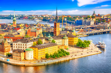 Beautiful aerial view of Stockholm Old town Gamla Stan from the City Hall Stadshuset. Beautiful summer sunny day in Stockholm, Sweden.