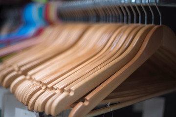 Fototapeta na wymiar clothes hangers in the store