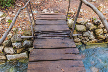 wooden bridge over the stream