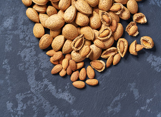 almond on black table ,Top view