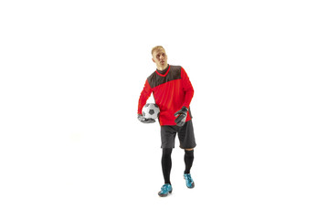 One male soccer player goalkeeper standing and holding ball. Silhouette isolated on white studio background