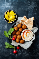 Middle Eastern traditional dinner. Authentic arab cuisine. Meze party food. Top view, flat lay,...