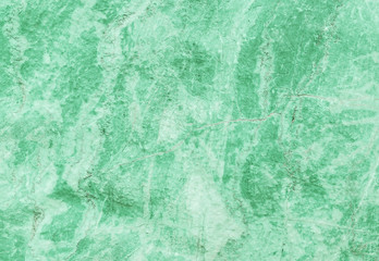 Closeup surface marble pattern at green marble stone wall textured background
