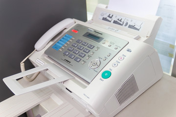 The fax machine for Sending documents in the office concept equipment needed in office