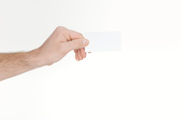 cropped view of man holding blank and empty card with copy space