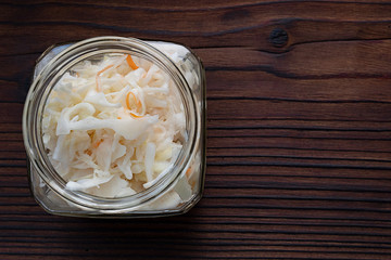 Homemade sauerkraut, pickled cabbage and carrots. Copy space.