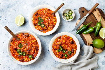 Vegetarian chili con carne with lentils, beans, lime, jalapeno. Mexican traditional dish