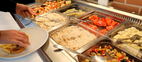 restaurant with many raw and cooked foods