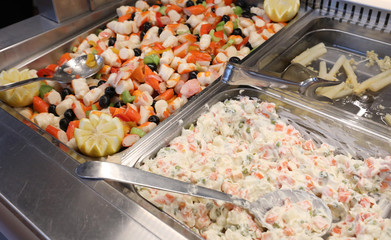 self service restaurant with many salad of vegetables or with fi