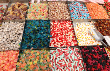 many colorful and sugary candies in the candy store