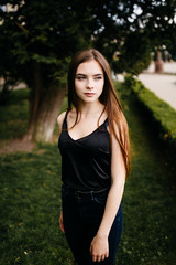 young girl posing on a street in the city