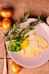 Naklejka na ściany i meble omelet of Golden eggs for Breakfast on wooden background
