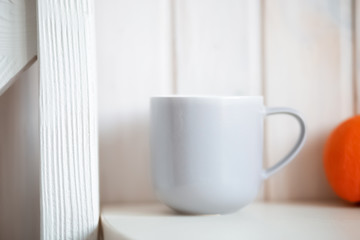 Gray mug on kitchen table