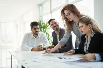 Group of business people collaborating in office
