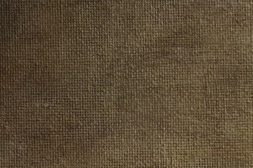 Abstract background texture of canvas painted with bituminous varnish