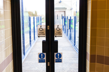 Disabled people entrance to the building. Doors for the special entrance for disabled people