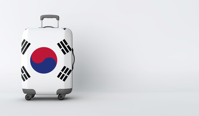 Travel suitcase with the flag of South Korea. Holiday destination. 3D Render