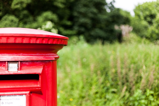 British red mailbox for gathering mail. Traditional mail gathering mailbox