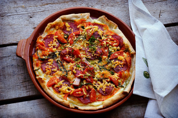 Delicious italian pizza served on wooden table