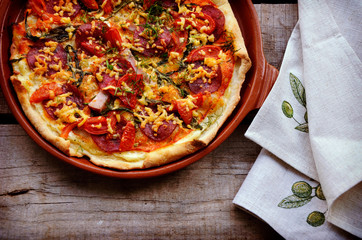 Delicious italian pizza served on wooden table