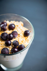 Healthy and tasty breakfast with muesli black currant and yogurt. Selective focus.