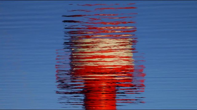 Eckernf&ouml;rde Lighthouse mirroring in the water