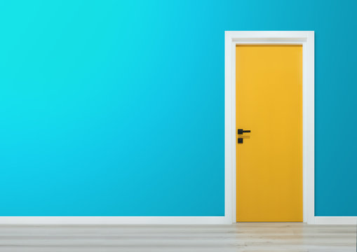 Yellow door with black handle in a gradient blue wall
