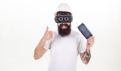 Man wearing virtual reality goggles in white background. Happy bearded man wearing virtual reality...