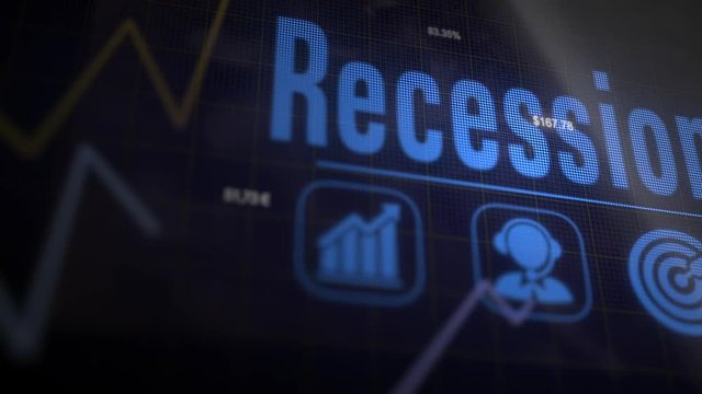 Recession business concept on a flashing computer monitor with moving graphs and data.