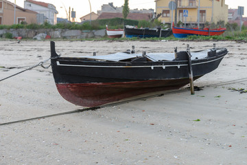 wooden fishing boat dries ashore