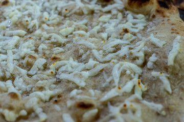 Arab cheese flakes on pita bread
