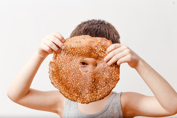the child looks at the hole in the pancake