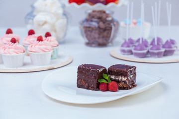 chocolate cake with strawberries on a white background