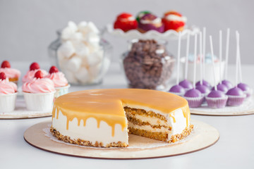 white cake with caramel topping