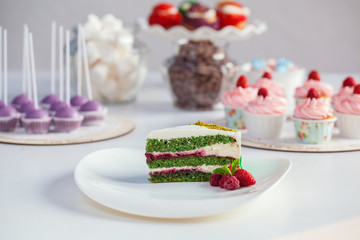 green cake with berries