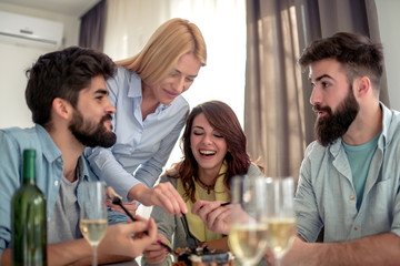 Friends celebrating birthday at home